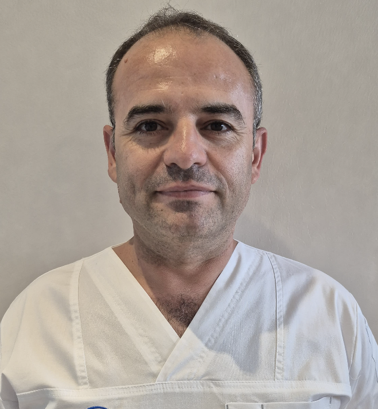 Dr. Daniel Caragea